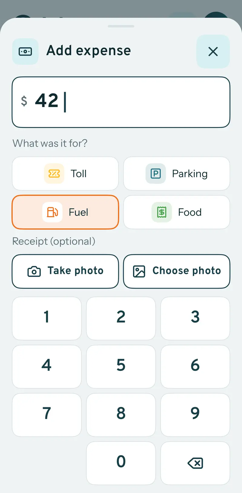 Add expense sheet with an amount field, Toll, Parking, Fuel and Food categories, options to take or choose a receipt photo, and a number pad