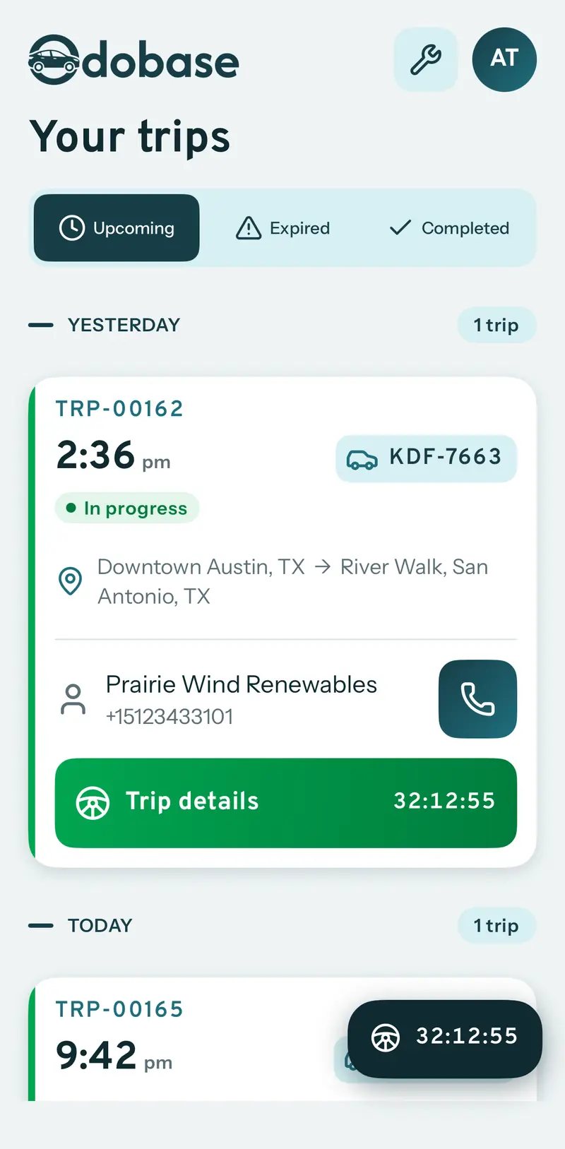 Your trips screen in the Odobase Driver app with Upcoming, Expired and Completed tabs and an in-progress trip card showing route, vehicle plate, customer and a running timer